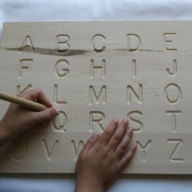 Handmade Double-sided wooden alphabet tracing boards with letters, shapes, or numbers.